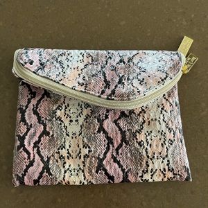 Beautiful faux snake embossed Ready To Wear New York cosmetics bag.